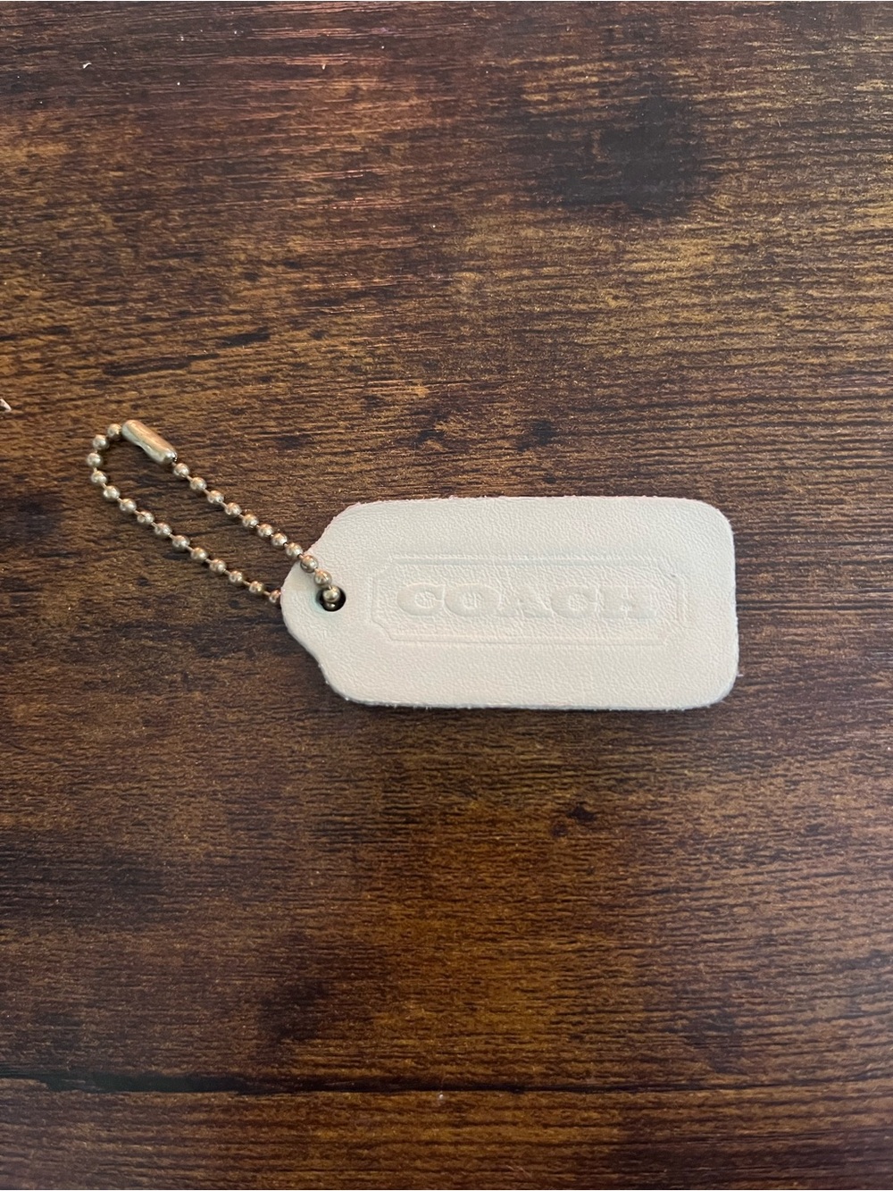 Vintage coach bone white hangtag